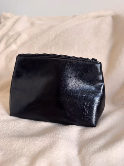 Yves Saint Laurent Black Pouch by Yves Saint Laurent — pre-loved on Thrifted.mt