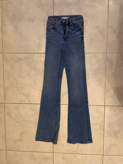 Zara Blue Flare Jeans by Zara — pre-loved on Thrifted.mt