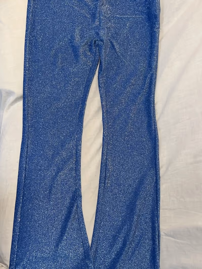 Blue glitter flared trousers by Don't Call Me Jennyfer — pre-loved on Thrifted.mt