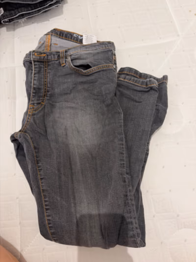 Gianni Versace Slim Fit Jeans by Versace — pre-loved on Thrifted.mt