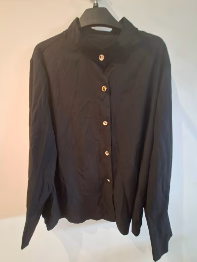 Elegant black long-sleeve blouse — pre-loved on Thrifted.mt