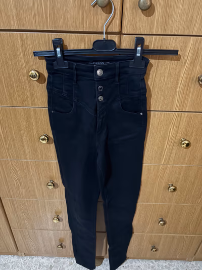 Black High-Waisted Guess Jeans by Guess — pre-loved on Thrifted.mt