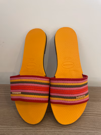 Havaianas colourful striped slide sandals by Havaianas — pre-loved on Thrifted.mt
