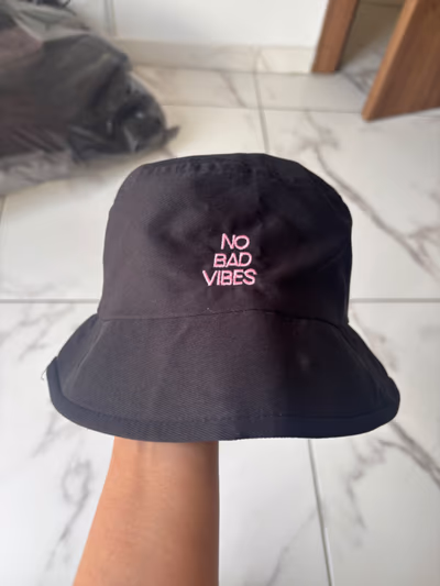 Black No Bad Vibes Bucket Hat — pre-loved on Thrifted.mt