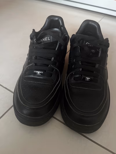 Black Leather Low Top Sneakers by Chanel — pre-loved on Thrifted.mt
