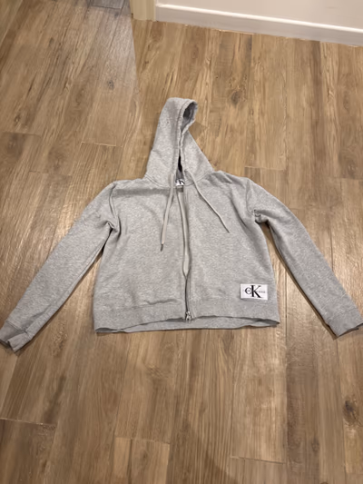 Calvin Klein Grey Zip Hoodie by Calvin Klein — pre-loved on Thrifted.mt