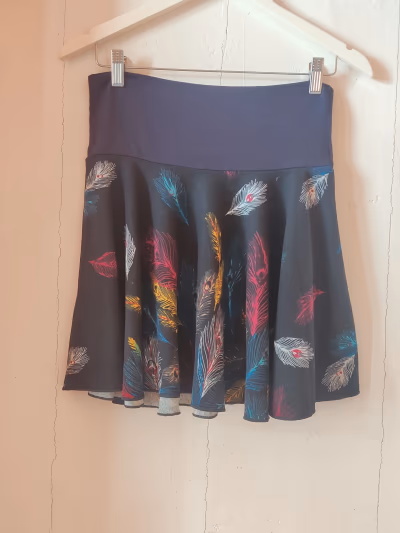 Black feather print flared skirt by No brand — pre-loved on Thrifted.mt