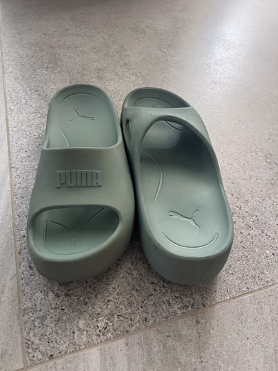 Puma Green Slides by Puma — pre-loved on Thrifted.mt