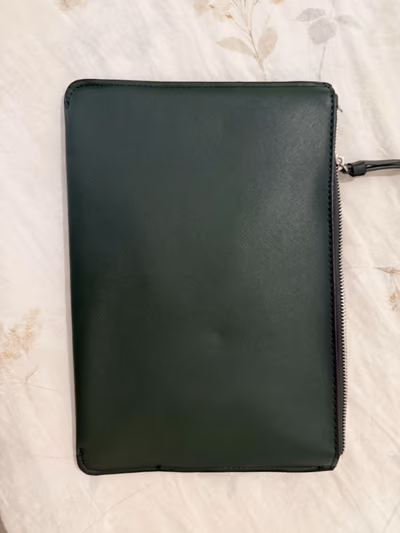 Dark green minimalist zip clutch by Mango — pre-loved on Thrifted.mt