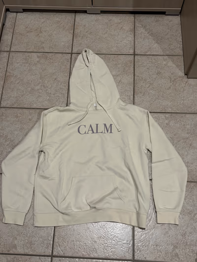 Primark Cream Calm Slogan Hoodie by Primark — pre-loved on Thrifted.mt