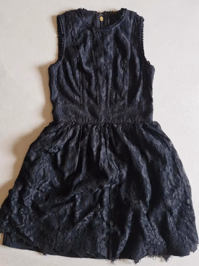 Juicy Couture Black lace mini dress — pre-loved on Thrifted.mt