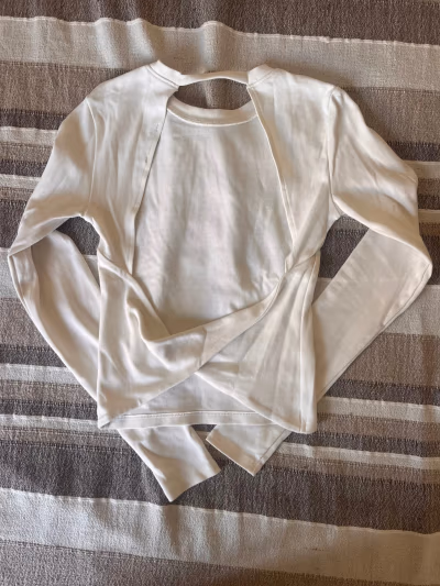 White ZARA long sleeve top with open back by ZARA — pre-loved on Thrifted.mt