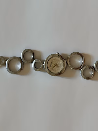 Fossil Silver Statement Bracelet Watch by Fossil — pre-loved on Thrifted.mt