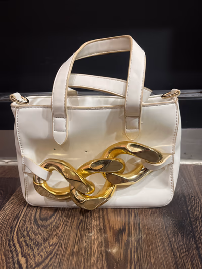 White handbag with gold chain — pre-loved on Thrifted.mt