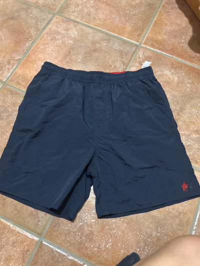 Navy French connection swim shorts  by French connection  — pre-loved on Thrifted.mt