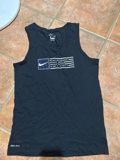 Nike Dri-Fit Graphic Vest by Nike — pre-loved on Thrifted.mt