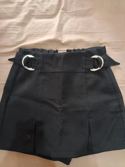Black high-waisted mini skirt by Bershka — pre-loved on Thrifted.mt
