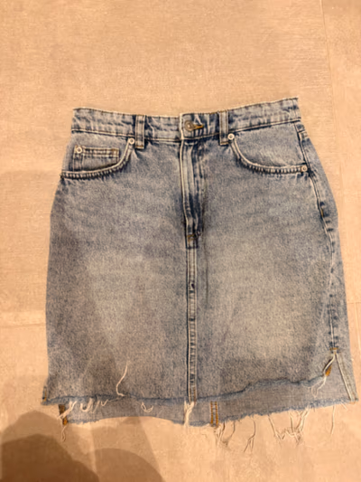 Womens Distressed Denim Mini Skirt by H&M — pre-loved on Thrifted.mt