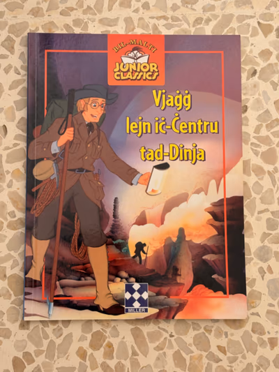 Vjaġġ lejn iċ-Ċentru tad-Dinja - Bil-Malti by Junior Classics Miller — pre-loved on Thrifted.mt