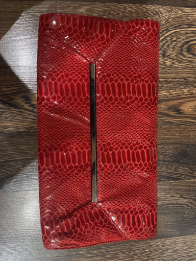Red snakeskin effect clutch bag — pre-loved on Thrifted.mt