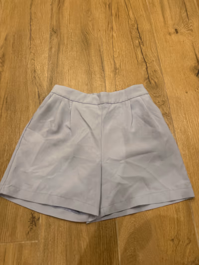 Pale blue tailored shorts by Kiabi — pre-loved on Thrifted.mt