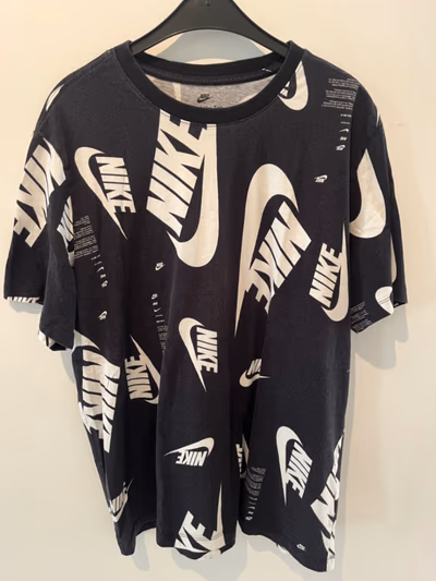 Nike All Over Print T-Shirt by Nike — pre-loved on Thrifted.mt