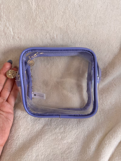Tatcha Purple Clear Travel Pouch by Tatcha — pre-loved on Thrifted.mt