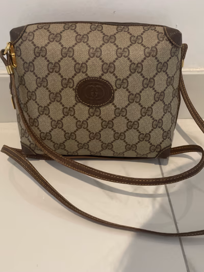 Vintage Gucci GG Supreme Interlocking G Crossbody Bag by Gucci — pre-loved on Thrifted.mt