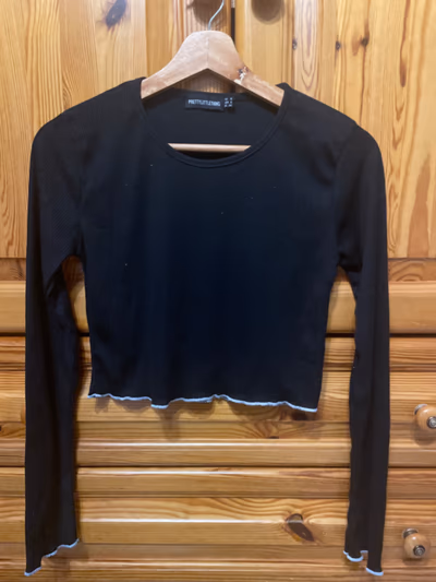 Black Ribbed Long Sleeve Top by PrettyLittleThing — pre-loved on Thrifted.mt