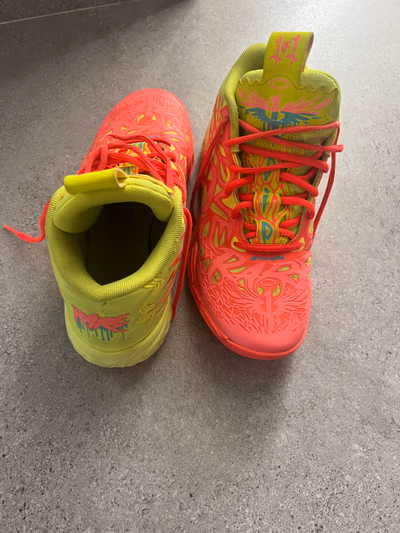 Puma vibrant high-top sneakers by Puma — pre-loved on Thrifted.mt
