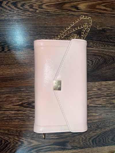Pale pink clutch bag — pre-loved on Thrifted.mt