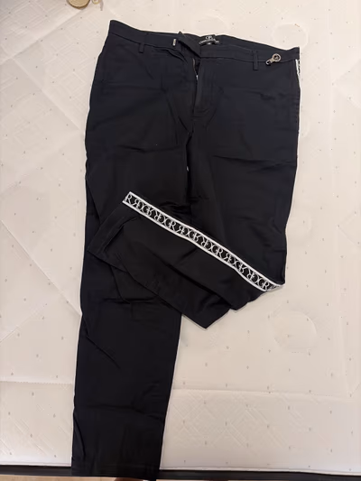 Charles & Ron Black Trousers by Charles & Ron — pre-loved on Thrifted.mt