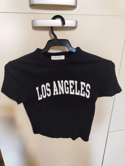 Black top — pre-loved on Thrifted.mt
