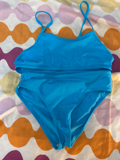 Kids blue bikini by Olaian — pre-loved on Thrifted.mt