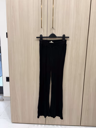 Black Ribbed Flared Trousers — pre-loved on Thrifted.mt