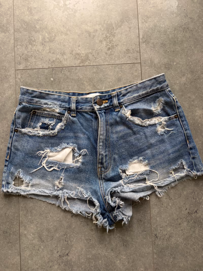Zara Distressed Denim Shorts by Zara — pre-loved on Thrifted.mt