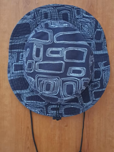 Khat Patterned Navy Bucket Hat — pre-loved on Thrifted.mt