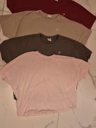 Gymshark oversized shirt bundle by Gymshark — pre-loved on Thrifted.mt
