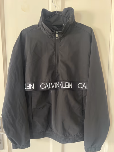 Calvin Klein quarter-zip jacket by Calvin Klein — pre-loved on Thrifted.mt