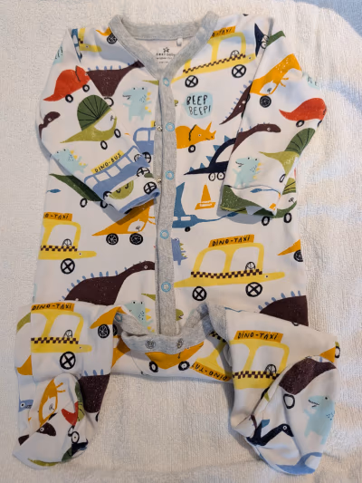 Next Dinosaur Print Baby Sleepsuit by Next — pre-loved on Thrifted.mt
