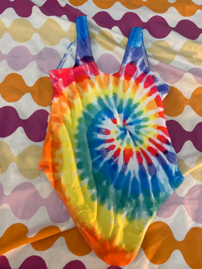 Rainbow kids swimsuit by No brand — pre-loved on Thrifted.mt