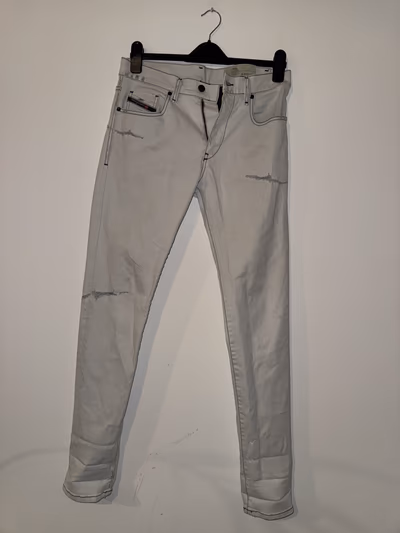 Diesel Distressed Slim Tapered Jeans by Diesel — pre-loved on Thrifted.mt