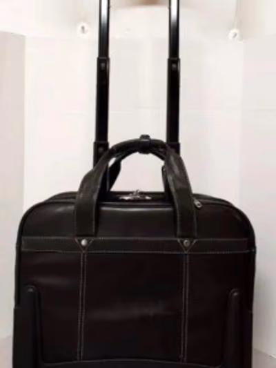Samsonite Black wheeled leather business travel bag — pre-loved on Thrifted.mt