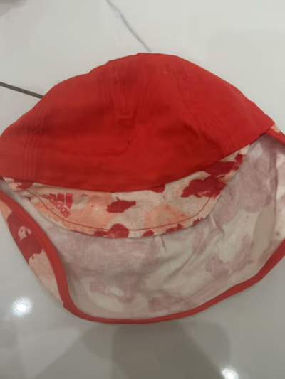 Adidas red floral sun hat by Adidas — pre-loved on Thrifted.mt