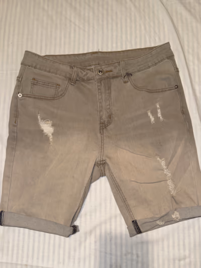 Distressed Denim Cut Off Shorts by SHEIN — pre-loved on Thrifted.mt