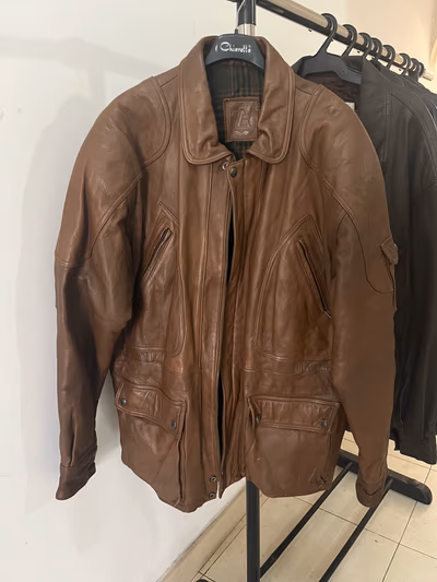 Brown Leather Jacket with Checked Lining — pre-loved on Thrifted.mt