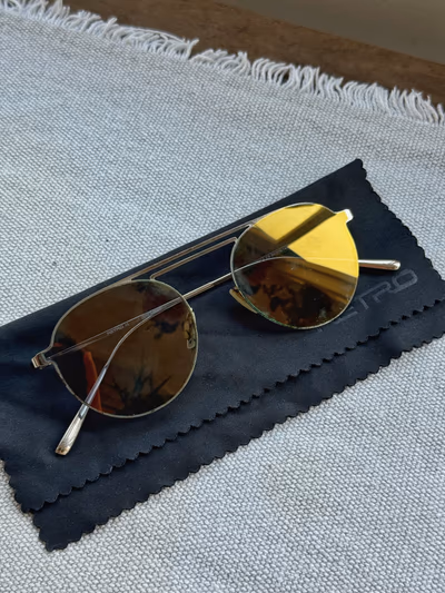 Retro Grey Reflector Sunglasses by Retro — pre-loved on Thrifted.mt