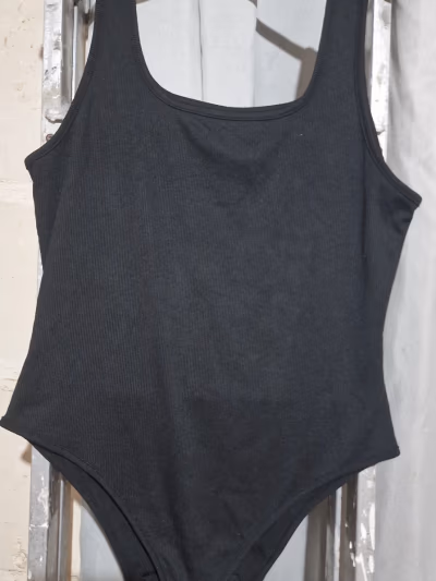Black Ribbed Sleeveless Bodysuit by SHEIN CURVE — pre-loved on Thrifted.mt