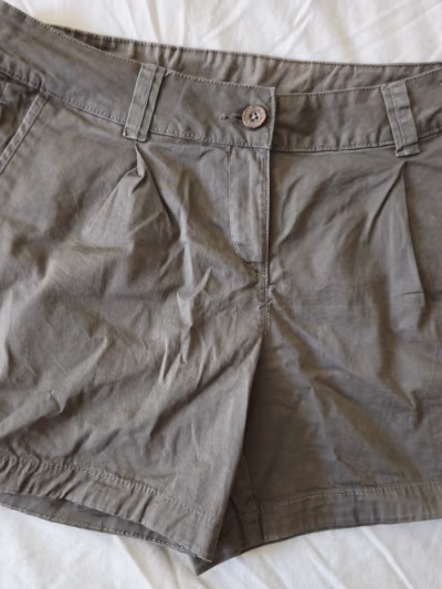 Green Quechua Walking Shorts by Quechua — pre-loved on Thrifted.mt