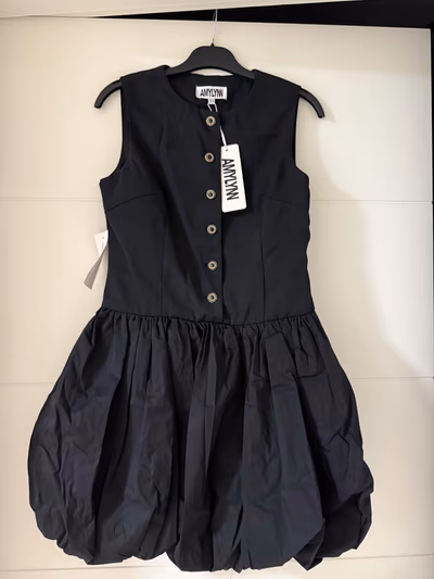Black button-down bubble dress by AMYLYN — pre-loved on Thrifted.mt